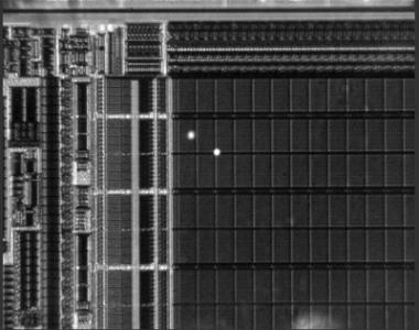 Laser spots visible through the silicon of one circuit - injection laser faults